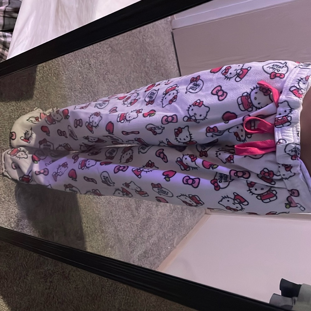 White and pink hello Kitty pajama pants they have pockets